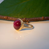 14K yellow gold star ruby cabochon ring with diamond accents