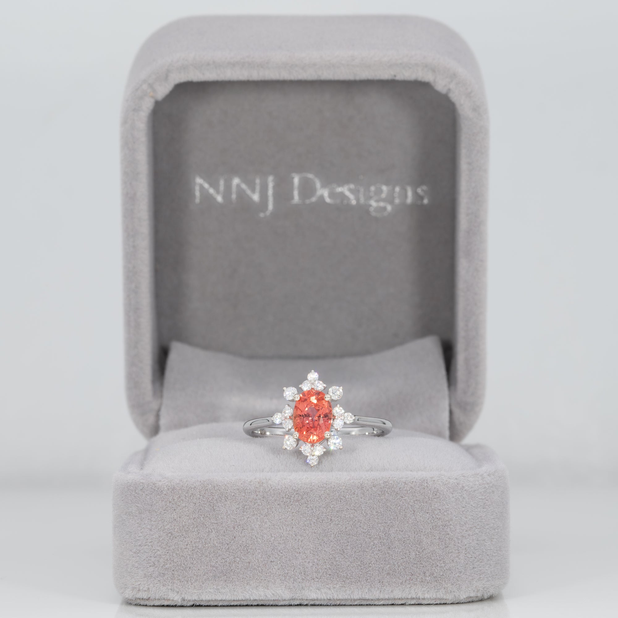 14K white gold padparadscha sapphire ring with diamond accents