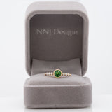 14K yellow gold tsavorite garnet round ring with diamond accents