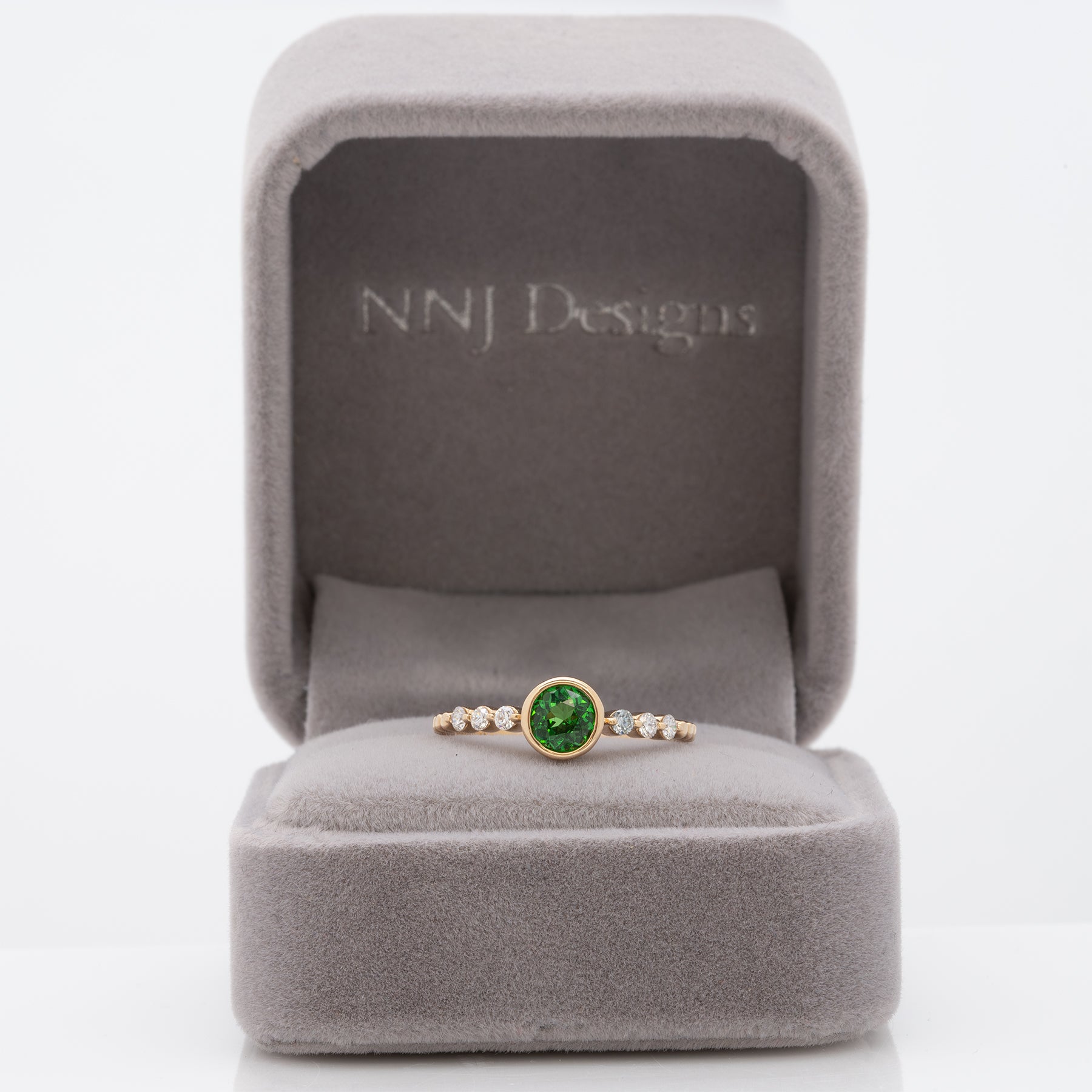 14K yellow gold tsavorite garnet round ring with diamond accents