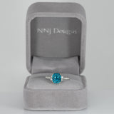 14K white gold Cambodian blue zircon cushion ring with diamond accents