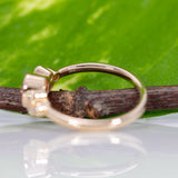 14K yellow gold bezel-set purple spinel ring with diamond accents