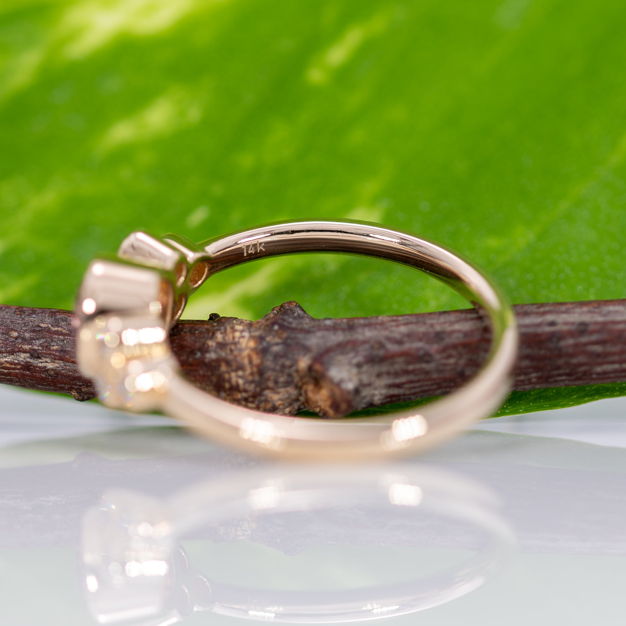 14K yellow gold bezel-set purple spinel ring with diamond accents