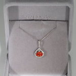 14K white gold padparadscha sapphire pendant