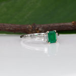 14K white gold Colombian emerald ring with diamond accents