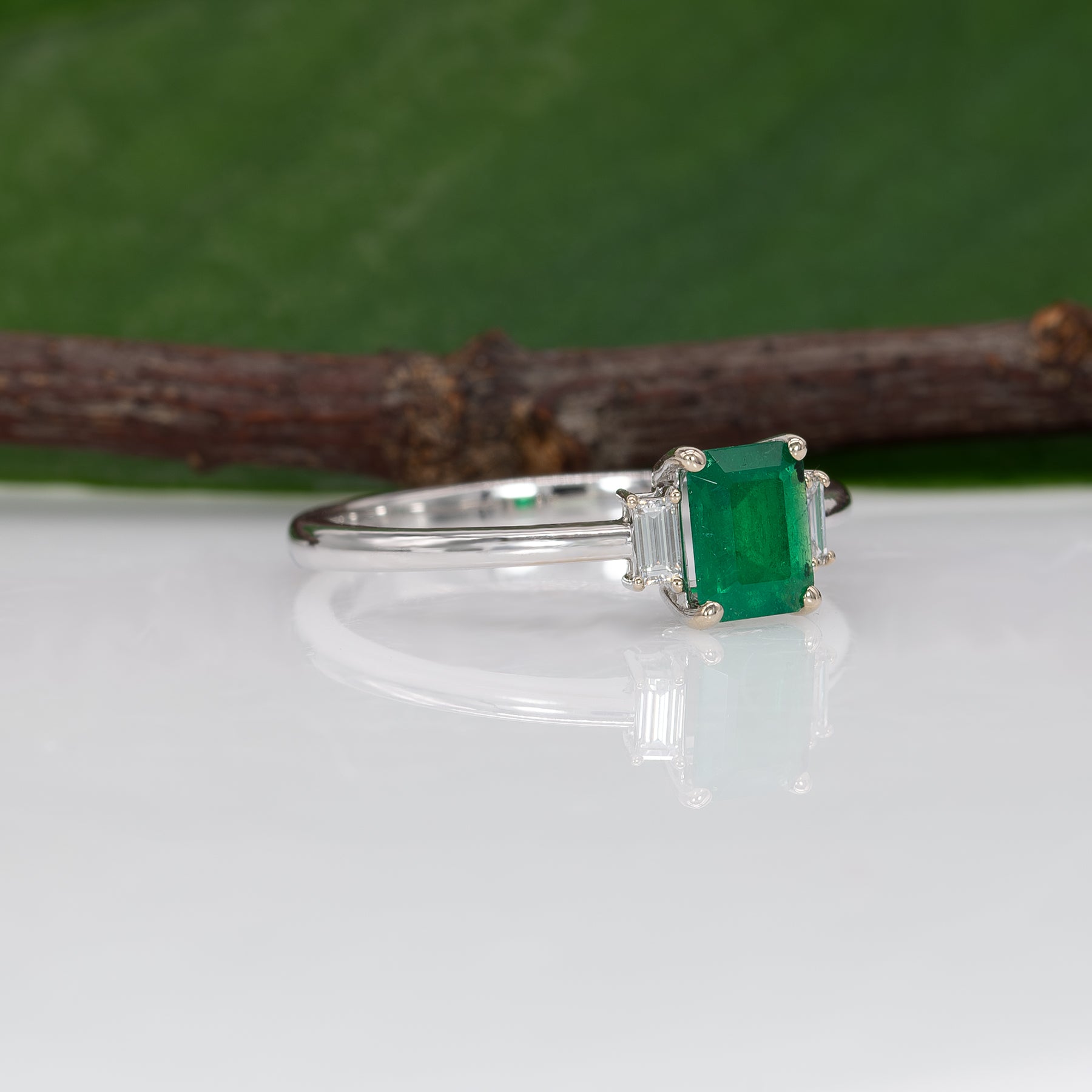 14K white gold Colombian emerald ring with diamond accents