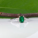 14K white gold Zambian emerald ring with diamond accents