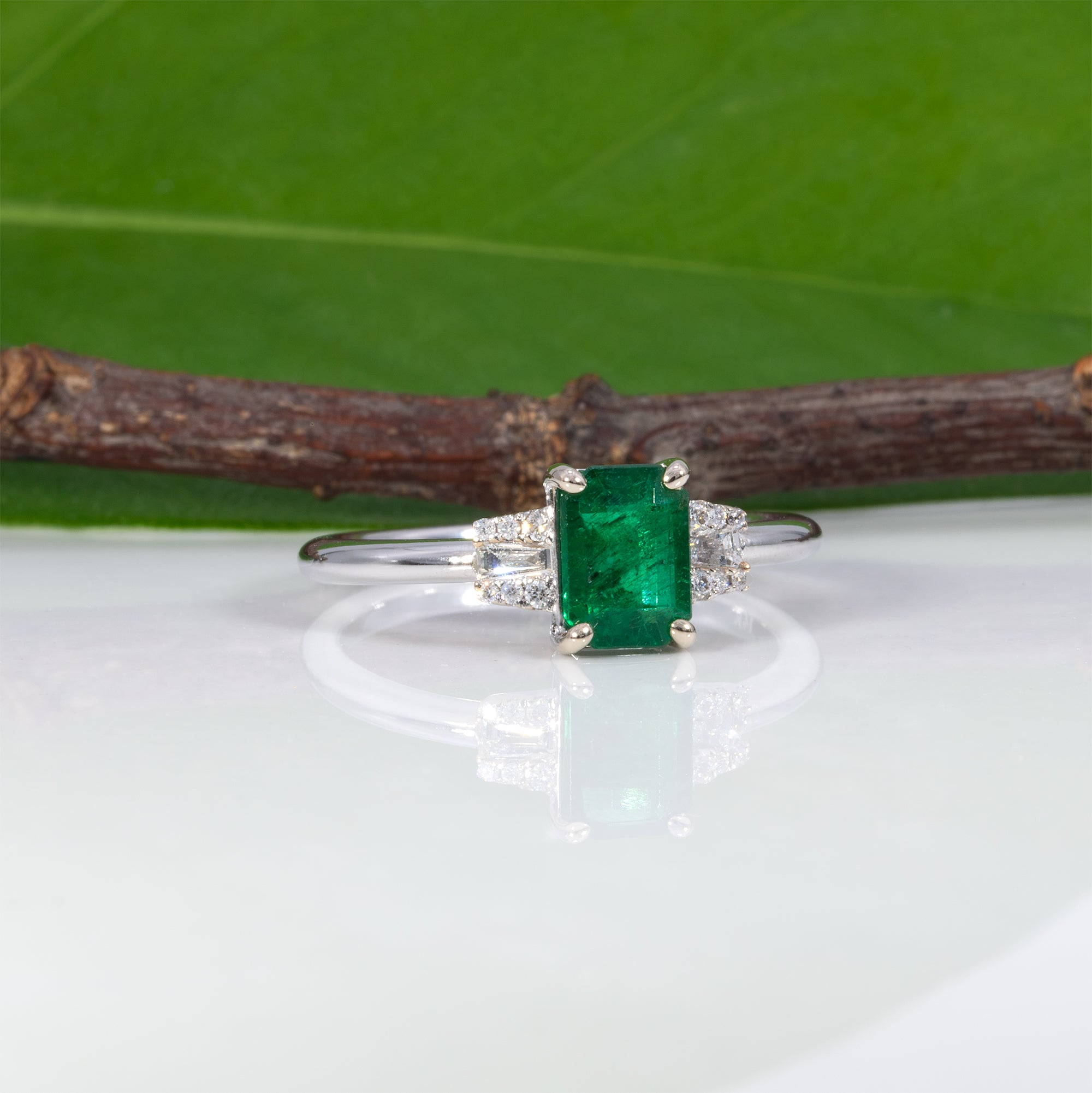 14K white gold Zambian emerald ring with diamond accents