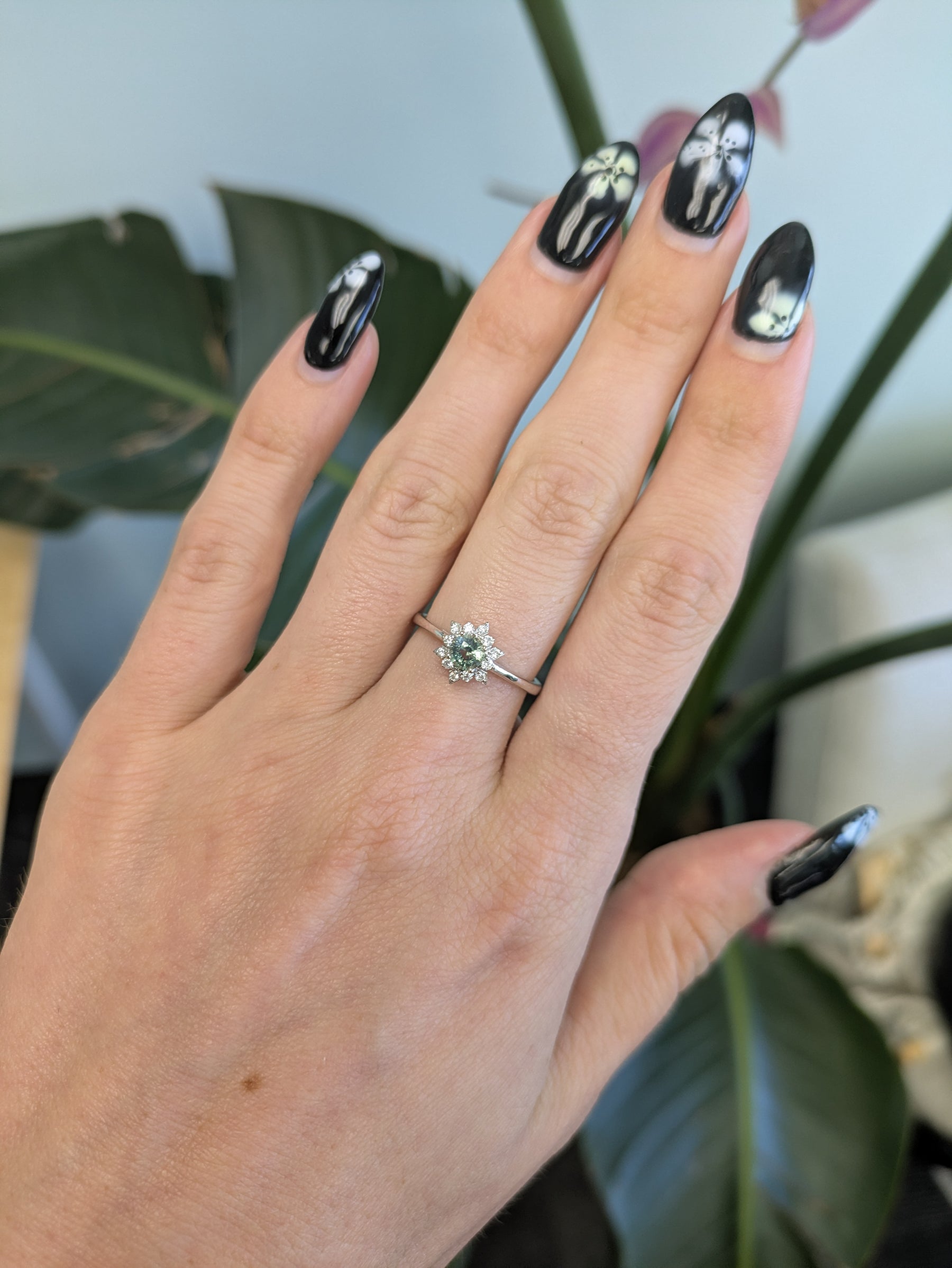 14K white gold alexandrite ring with diamond accents
