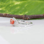14K white gold padparadscha sapphire ring with diamond accents