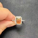 14K white gold bi-color tourmaline emerald-cut ring with diamond halo
