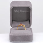 14K yellow gold padparadscha sapphire ring with diamond accents