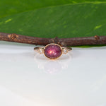 14K rose gold star ruby cabochon ring with diamond accents