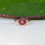 14K rose gold star ruby cabochon ring with diamond accents