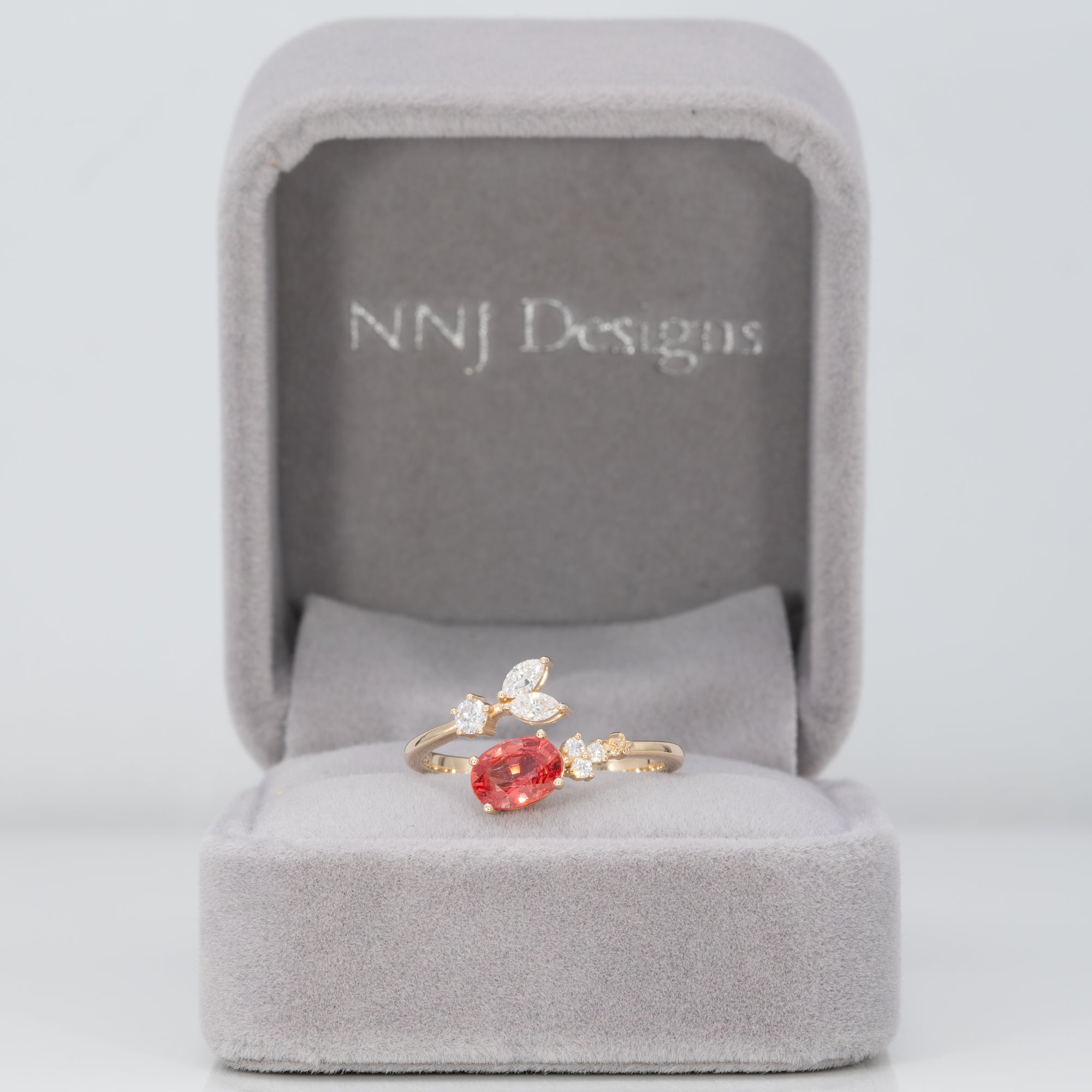14K yellow gold padparadscha sapphire ring with diamond accents