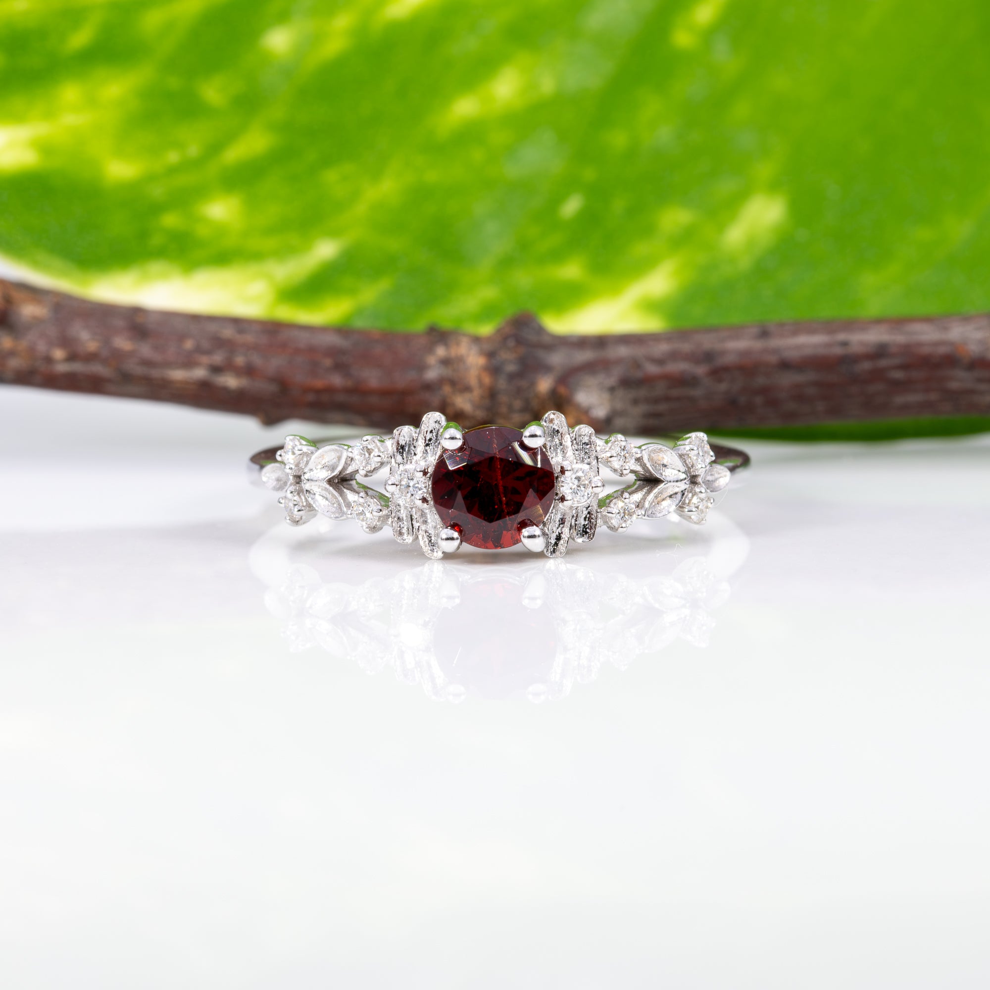 14K white gold red spinel ring with diamond accents
