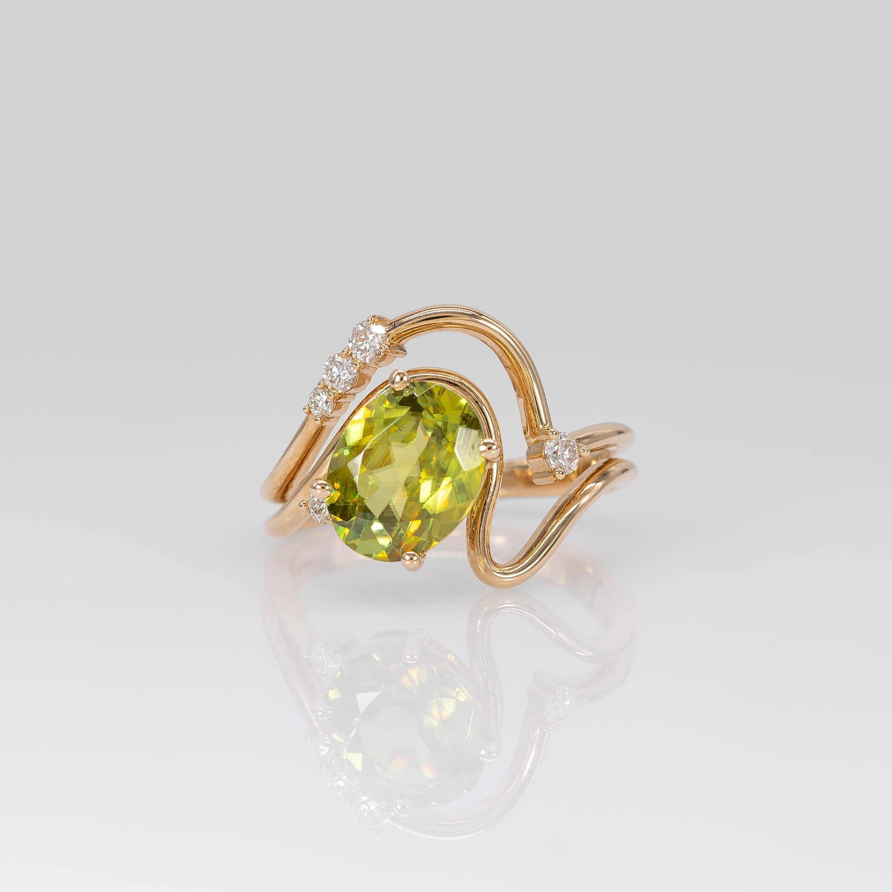 14K yellow gold sphene ring with diamond halo