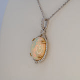 14K white & yellow gold ethiopian opal pendant with diamond accents