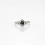 14K white gold pear alexandrite ring with diamond halo
