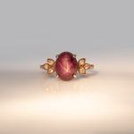 14K rose gold star ruby cabochon ring with diamond accents