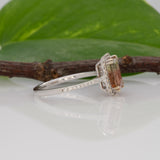 14K white gold bi-color tourmaline emerald-cut ring with diamond halo