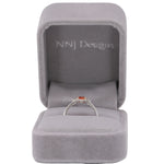 14K white gold padparadscha sapphire ring with diamond halo