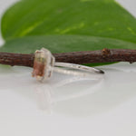 14K white gold bi-color tourmaline emerald-cut ring with diamond halo