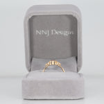14K yellow gold bezel-set purple spinel ring with diamond accents