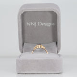 14K yellow gold bezel-set purple spinel ring with diamond accents