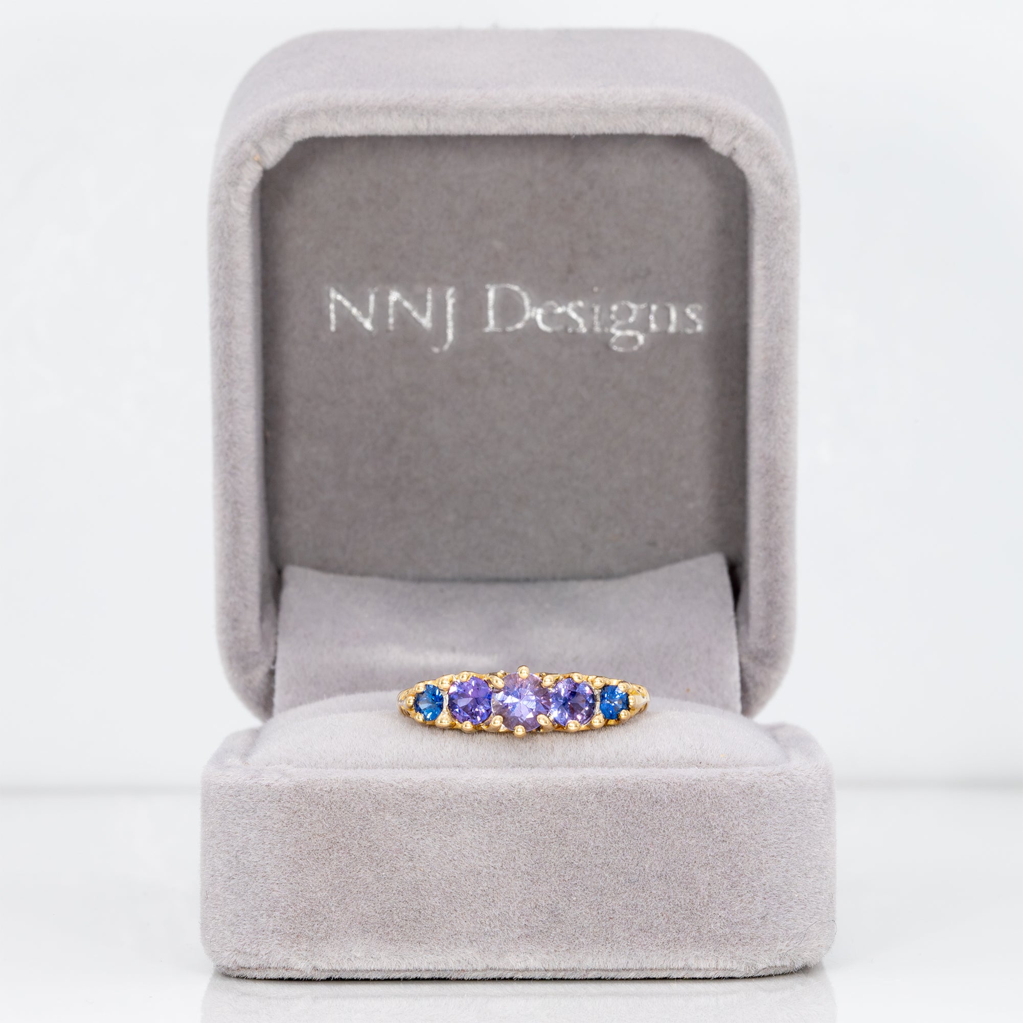 18K yellow gold estate ring with blue and purple sapphires