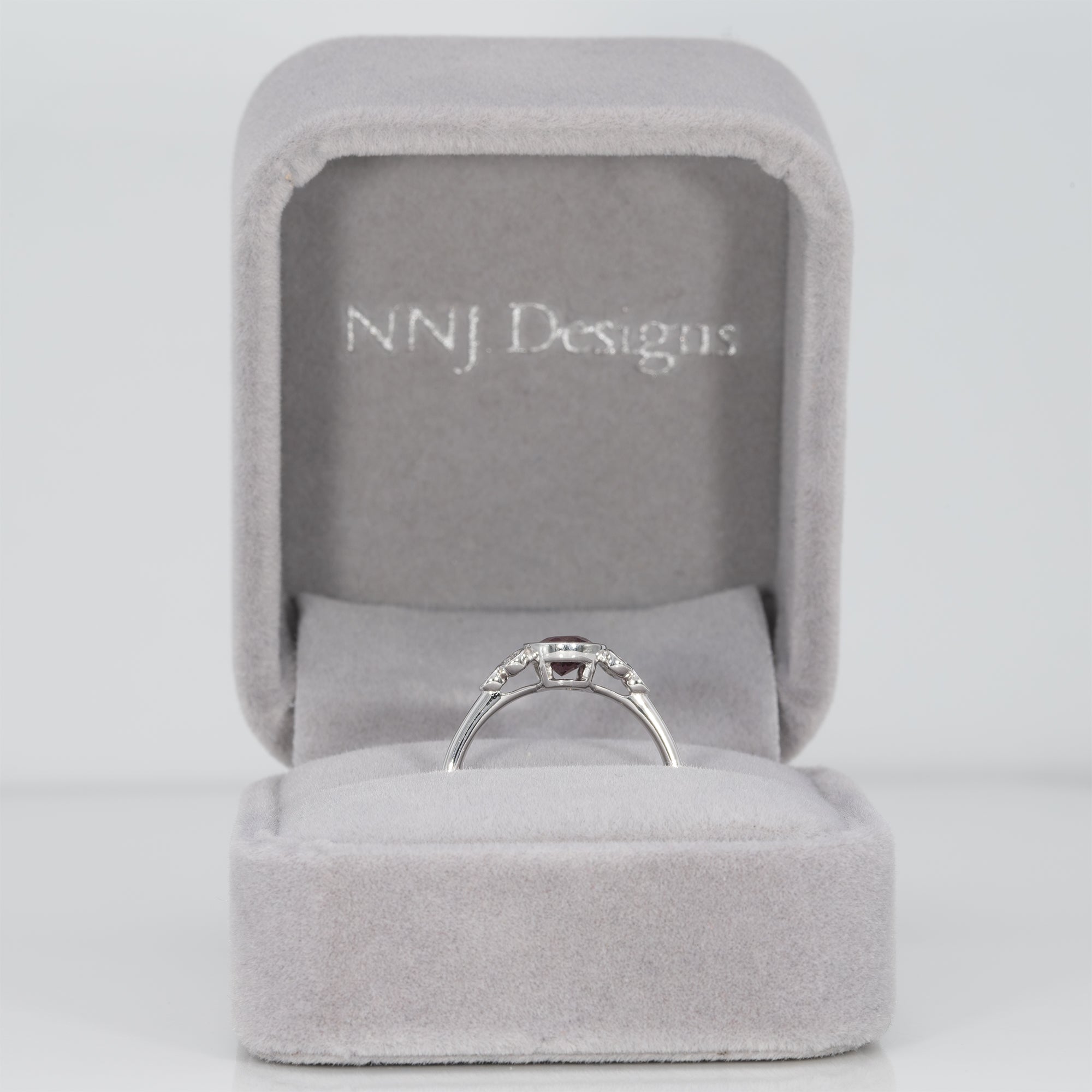 14K white gold purple spinel ring with diamond accents