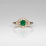 14K yellow gold Colombian emerald ring with diamond accents