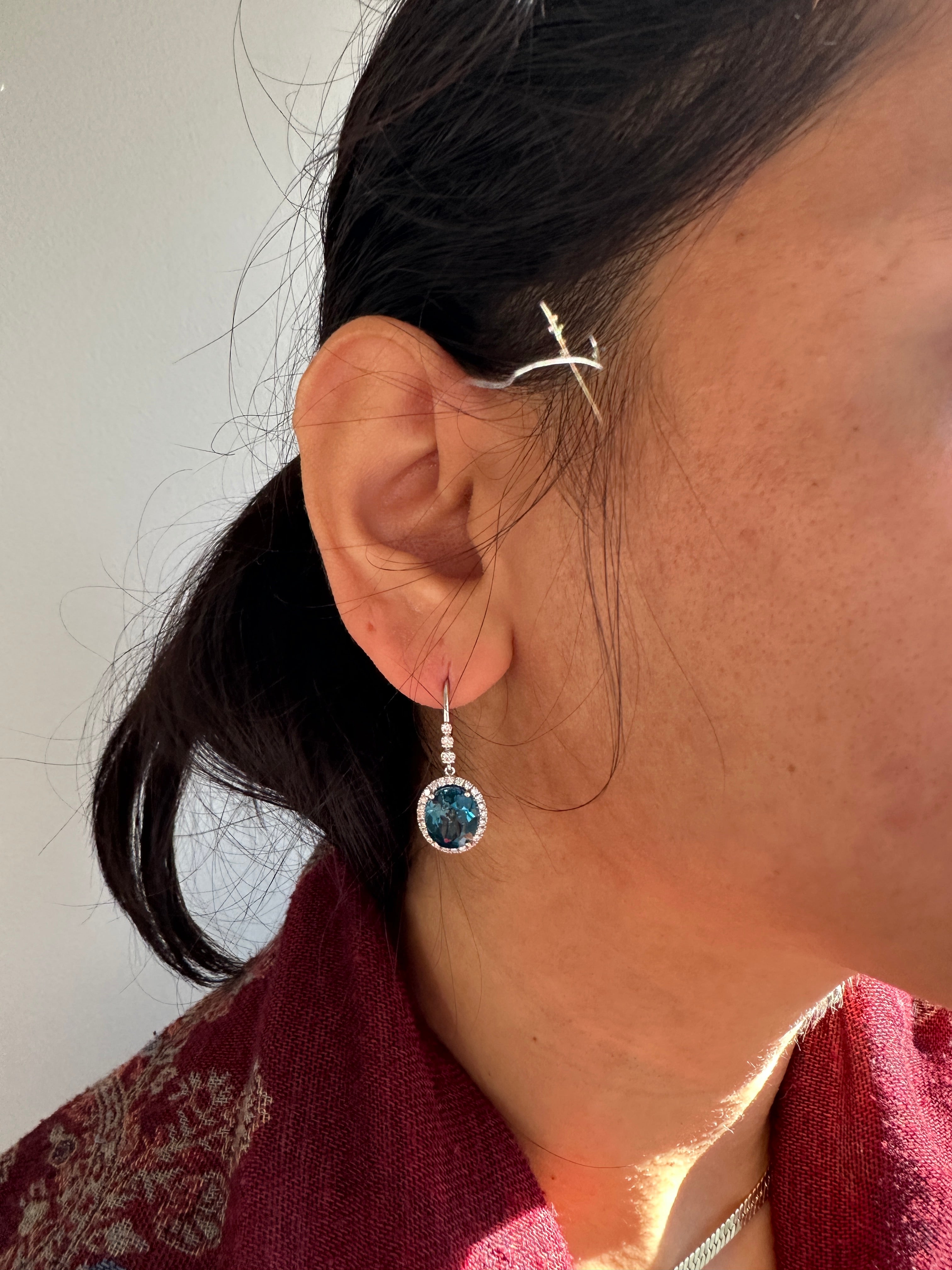 London Blue Topaz Stud Earrings in 14K White Gold | Diamond Accents | Oval Cut | 11x9mm | November Birthstone