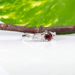 14K white gold red spinel ring with diamond accents