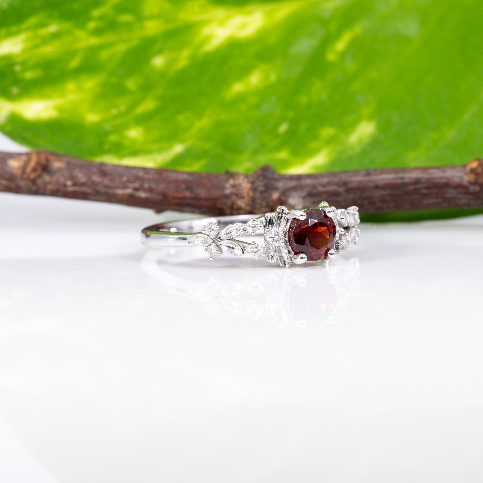 14K white gold red spinel ring with diamond accents