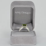 14K white gold peridot oval ring with diamond halo