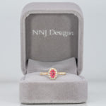 14K yellow gold padparadscha sapphire ring with diamond accents
