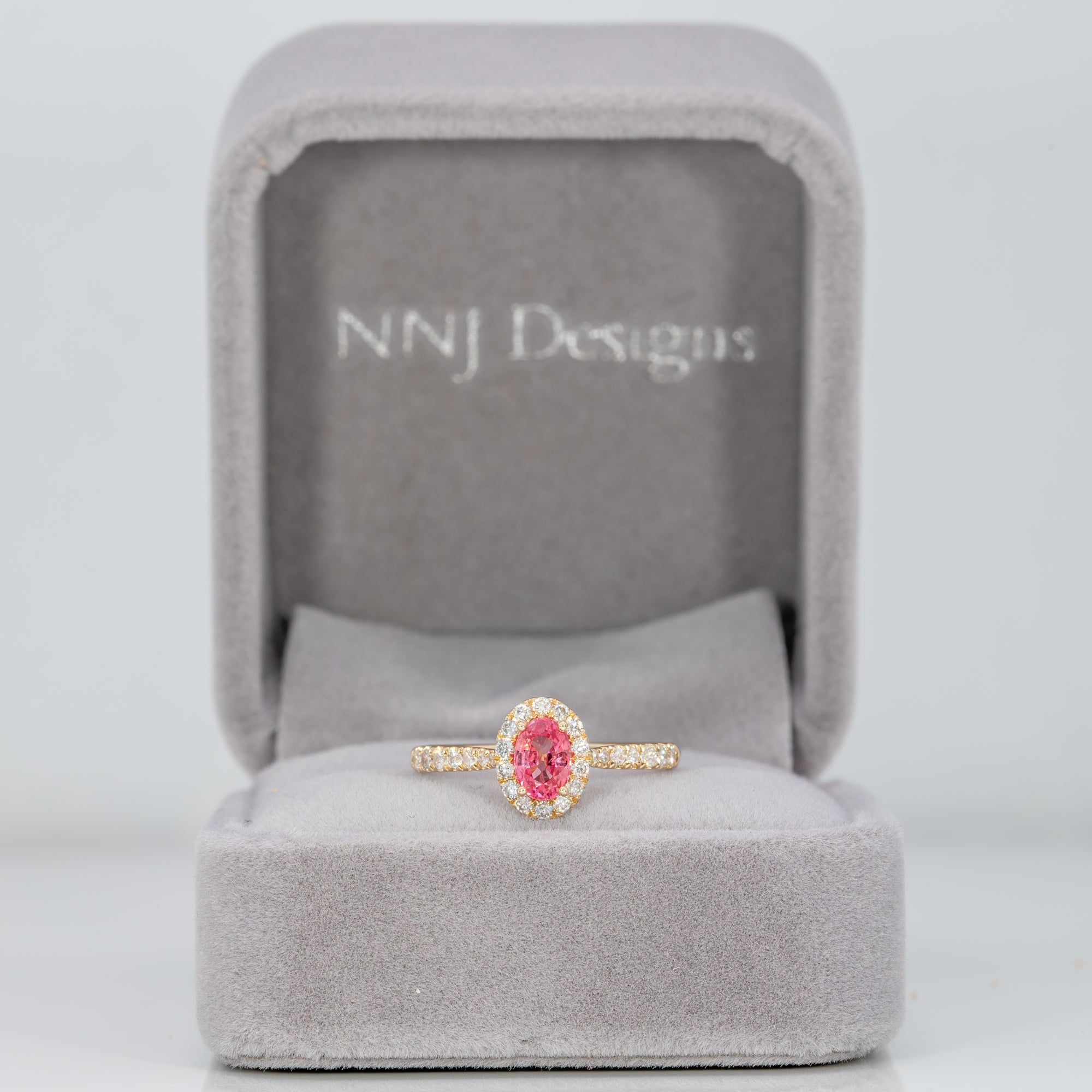 14K yellow gold padparadscha sapphire ring with diamond accents