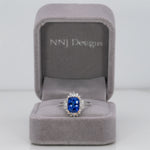 14K white and rose gold tanzanite ring with diamond accents