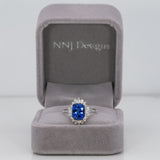 14K white and rose gold tanzanite ring with diamond accents