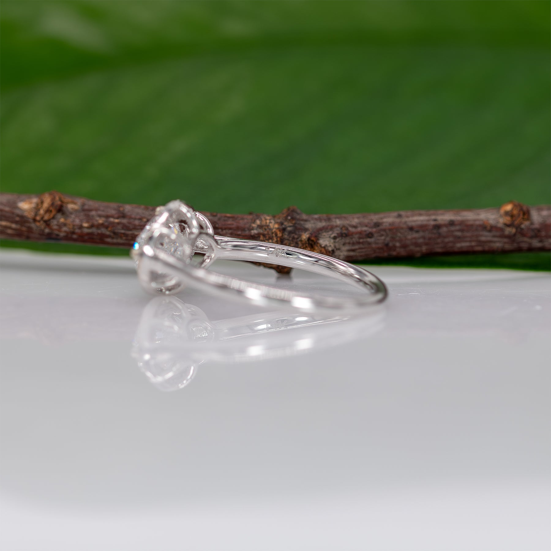 14K white gold oval lab grown diamond ring with diamond accents