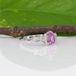 14K white gold pink sapphire pear ring with diamond halo