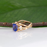 14K yellow gold cushion tanzanite ring with diamond accents