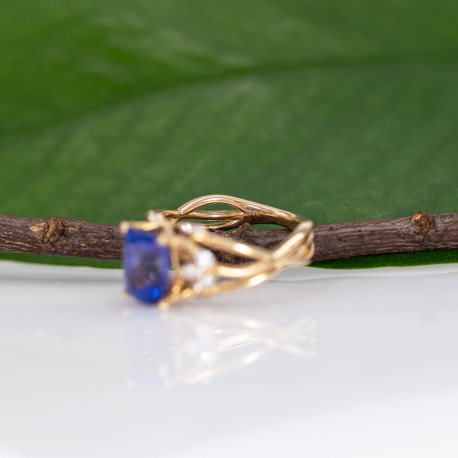 14K yellow gold cushion tanzanite ring with diamond accents