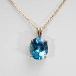 14K Yellow Gold Swiss Blue Topaz Pendant