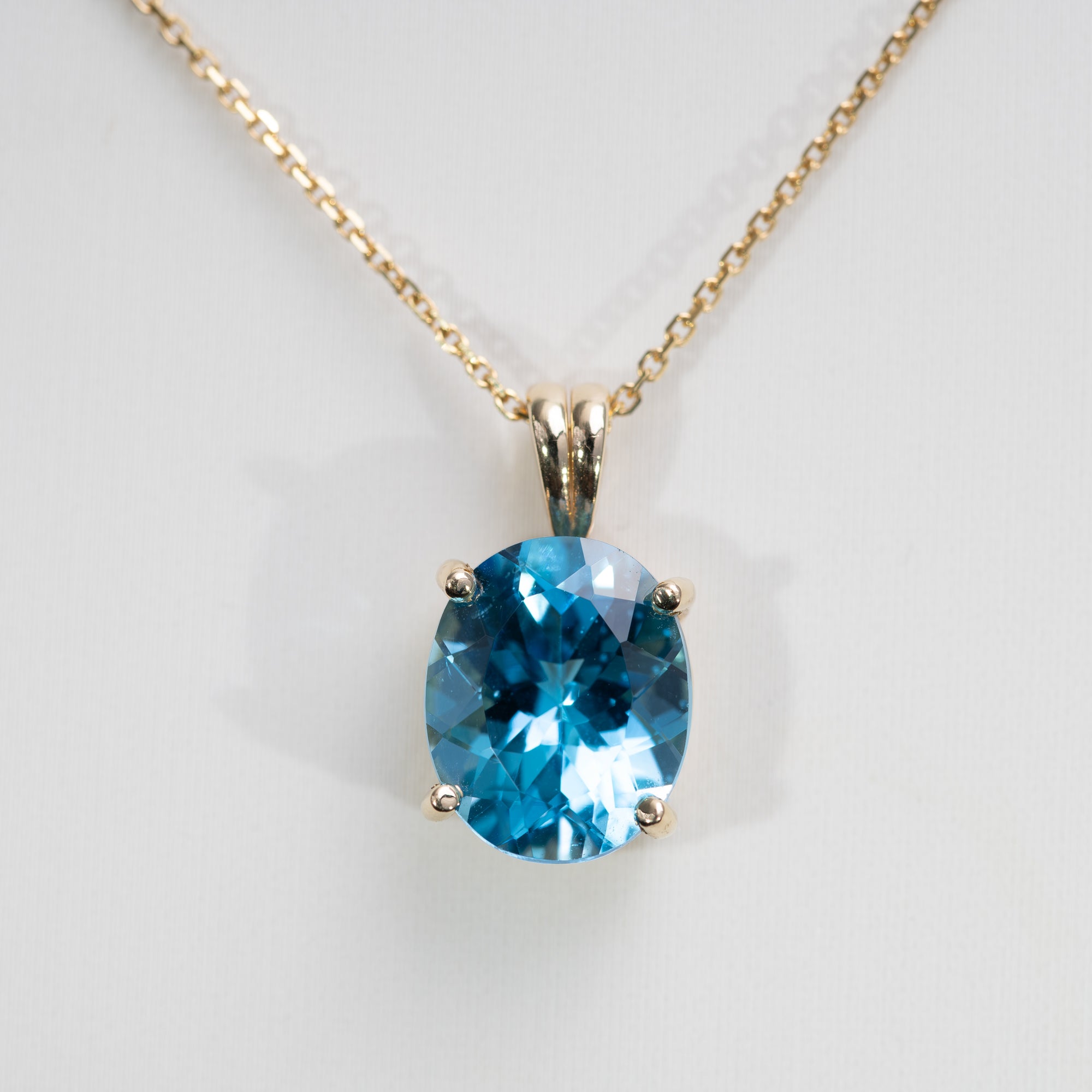 14K Yellow Gold Swiss Blue Topaz Pendant