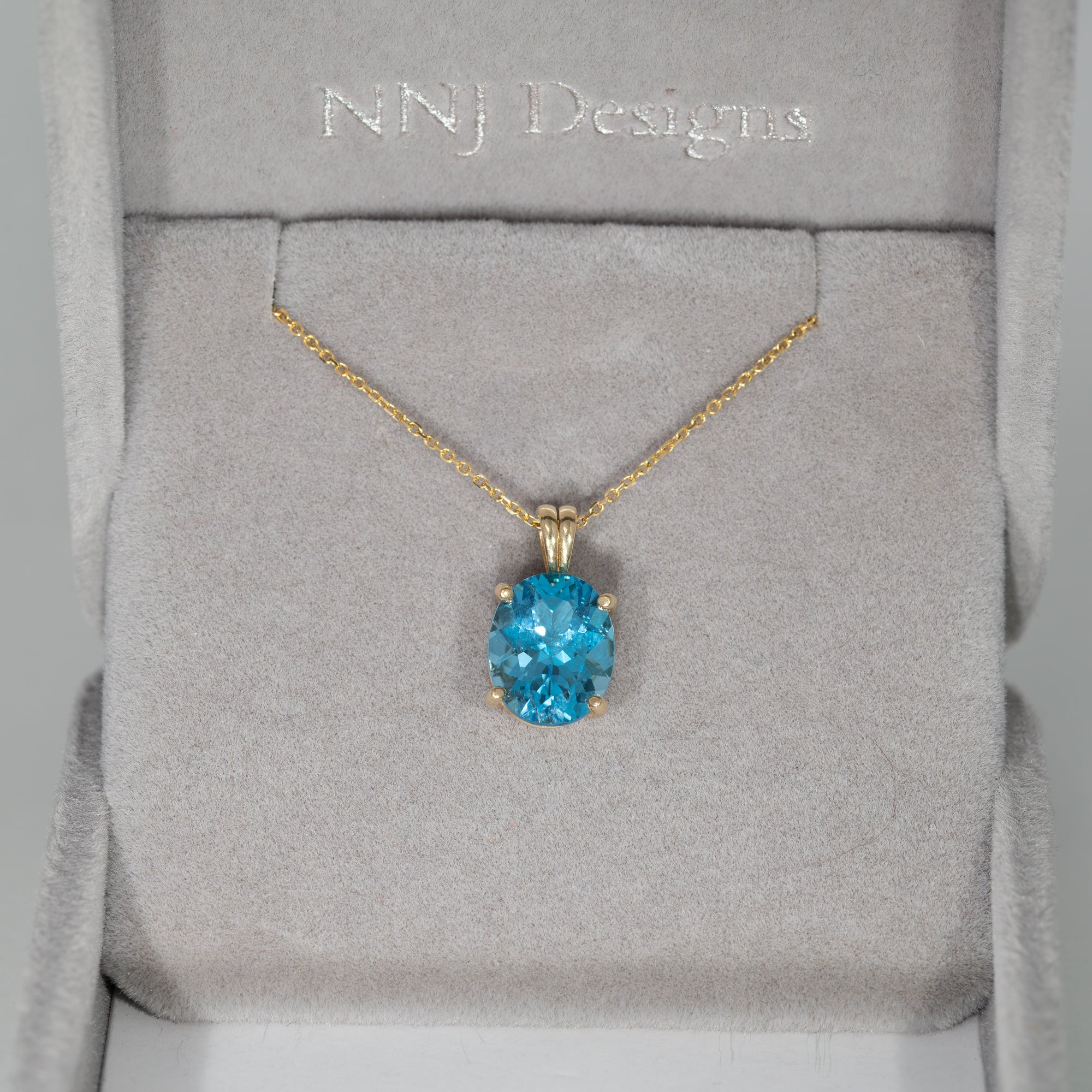 14K Yellow Gold Swiss Blue Topaz Pendant
