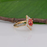 14K yellow gold padparadscha sapphire ring with diamond accents