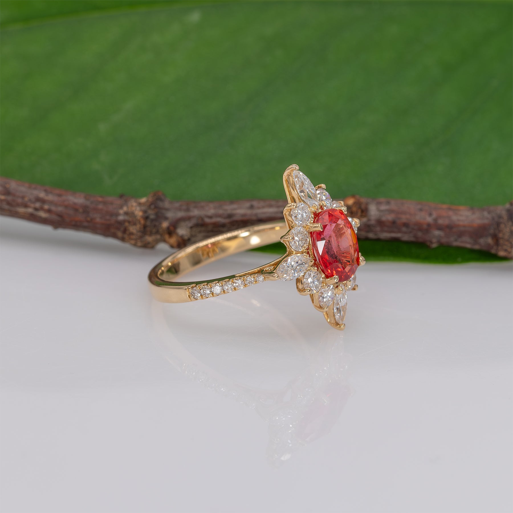 14K yellow gold padparadscha sapphire ring with diamond accents