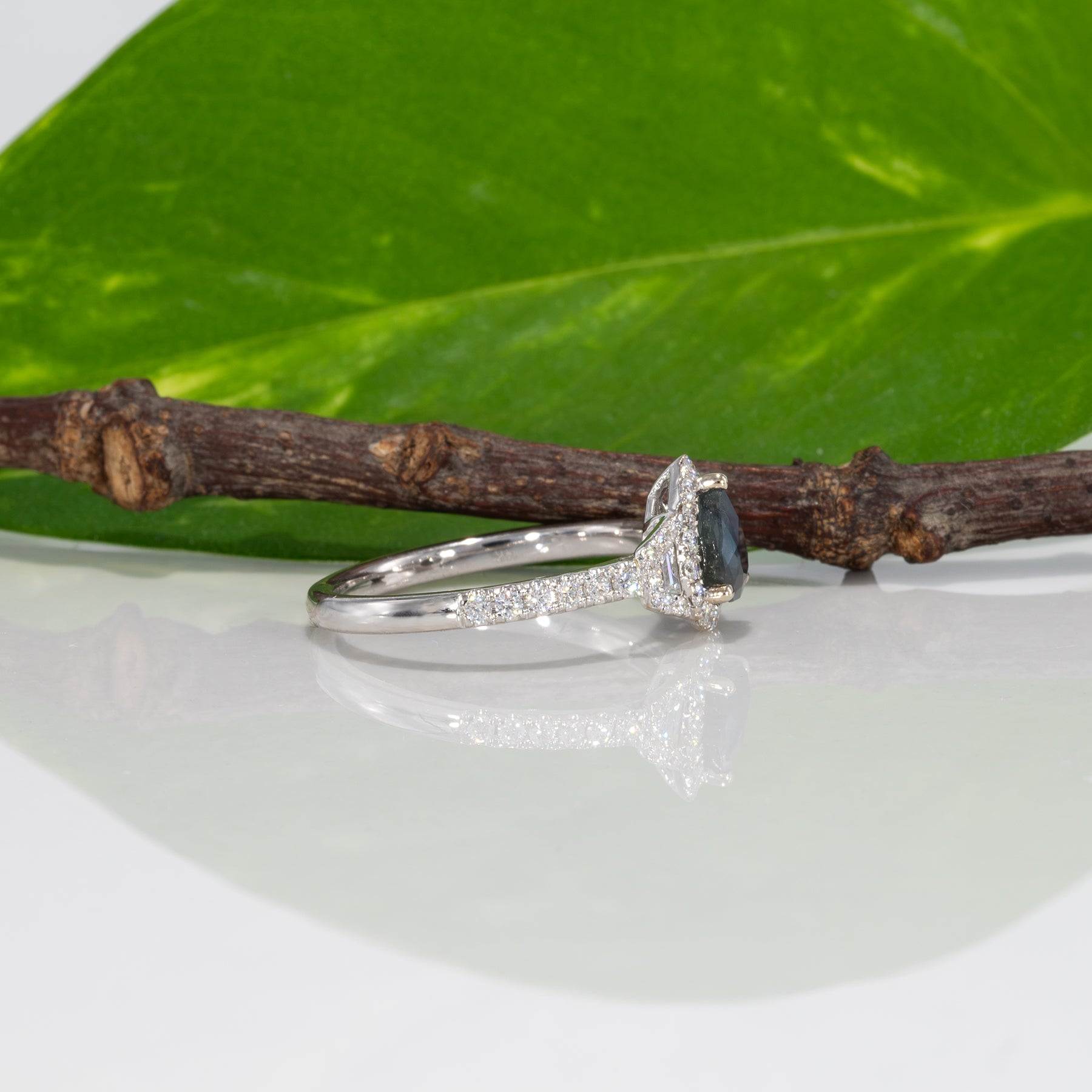 14K white gold pear alexandrite ring with diamond halo